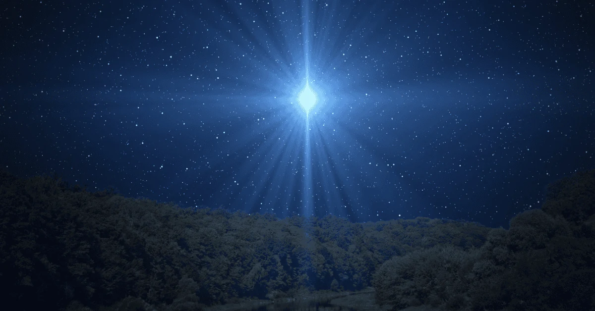 A symbolic bright star above a night landscape