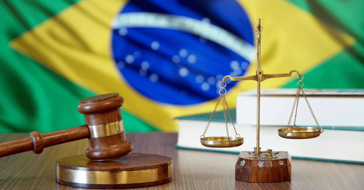 Brazilian flag with a gavel and scales illustrating a discussion of terminology